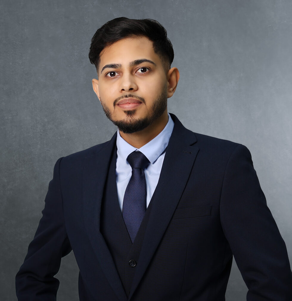 A photo of Salomen, our specialist paralegal in civil litigation and business immigration at Axis Solicitors. Get his advice in our Manchester office.