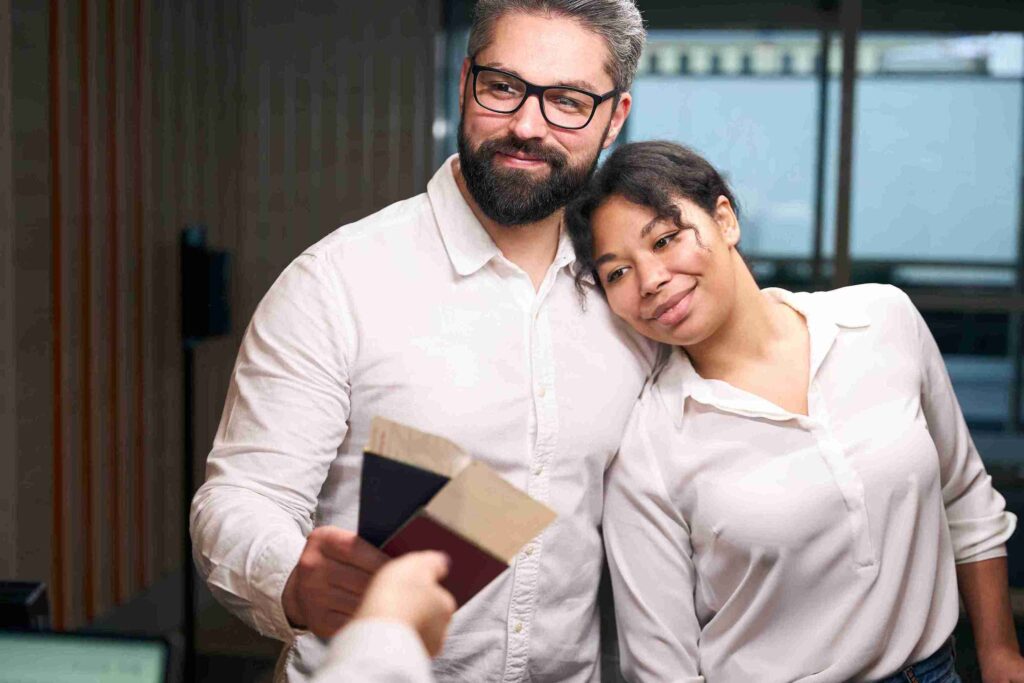 A photo of two Family Law Solicitors at Axis Solicitors explaining how clients can make a successful spouse visa applications for the UK in 2026.