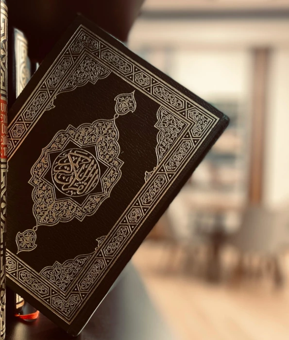 Islamic divorce expertise at Axis Solicitors in Manchester, Birmingham, and London, symbolised by religious texts and the Holy Quran.