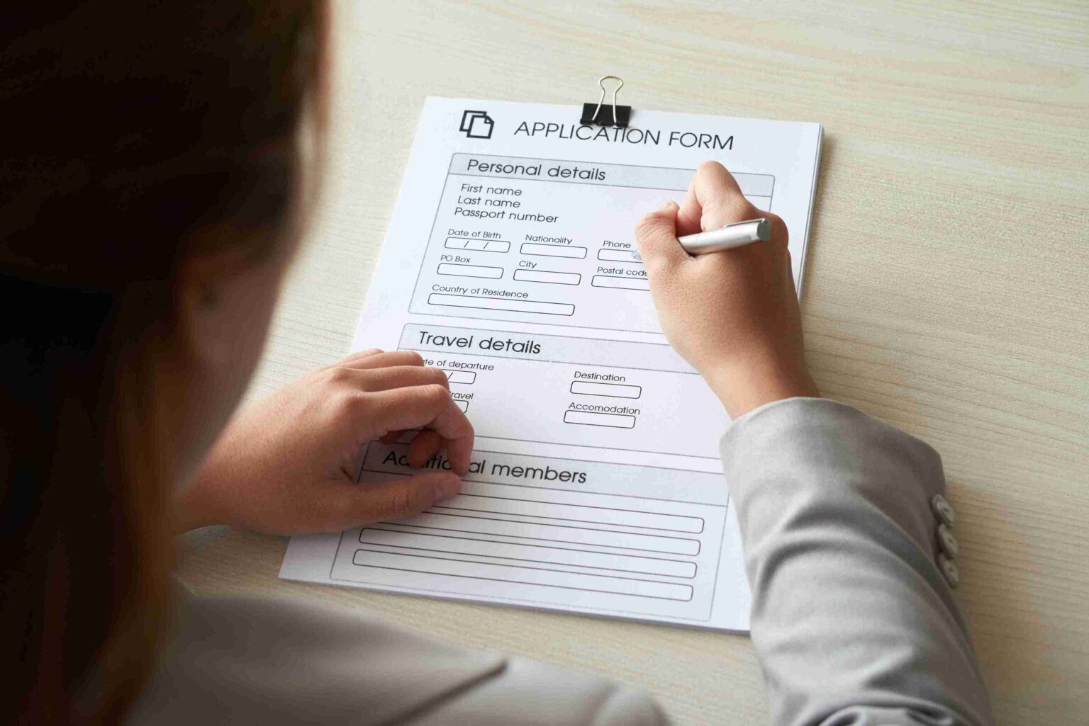 Solicitor carefully reviewing essential documentation for UK Sponsor Licence Applications.