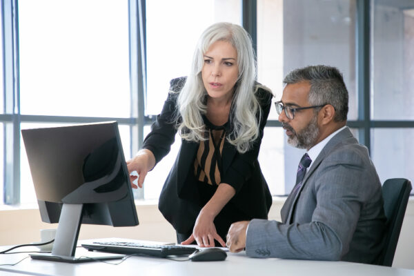 The Business Dispute Resolution Process (Business owners Discussing how to resolve a business dispute following a plan)