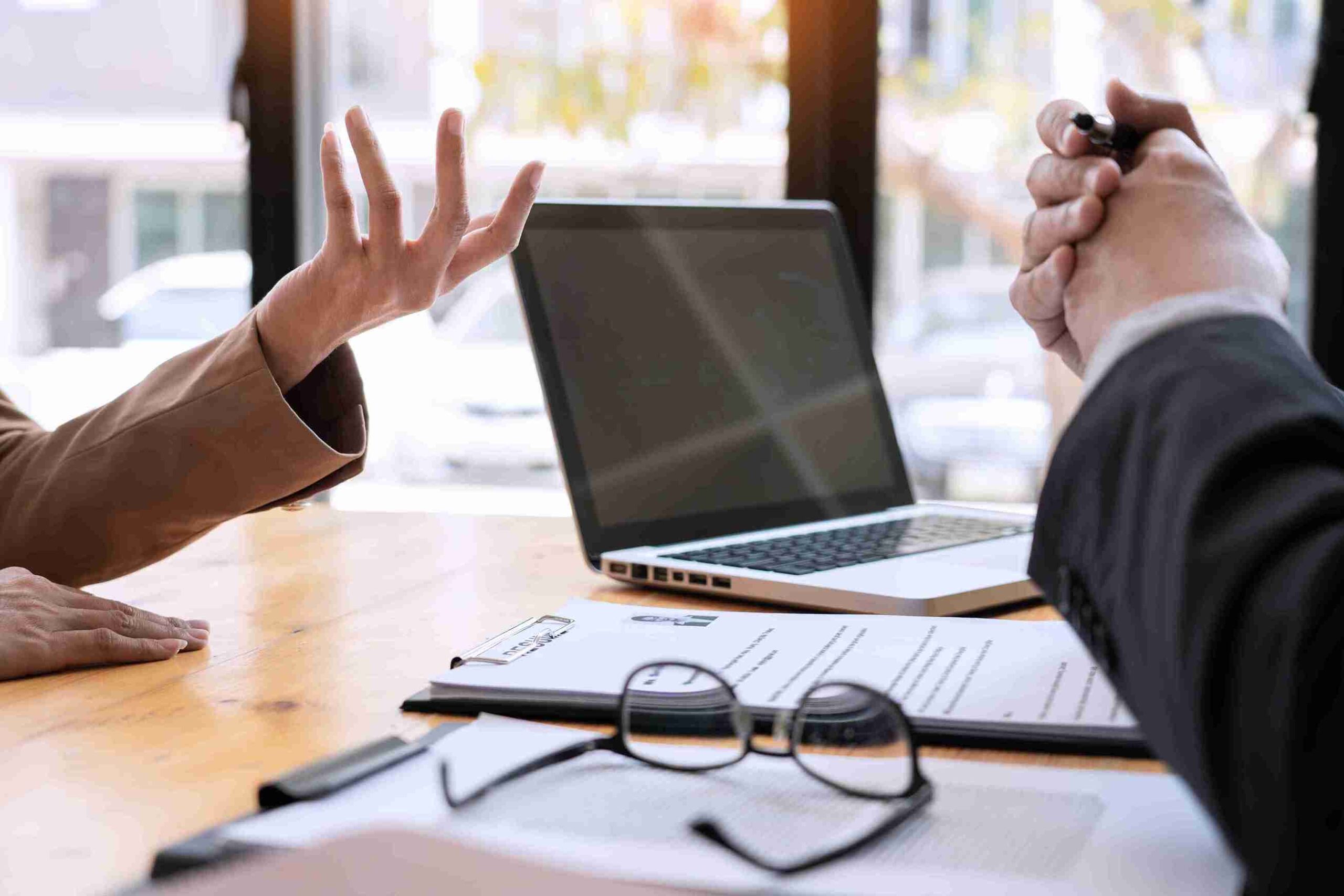 The Business Dispute Resolution Process (Business owners Discussing how to resolve a business dispute following a plan)