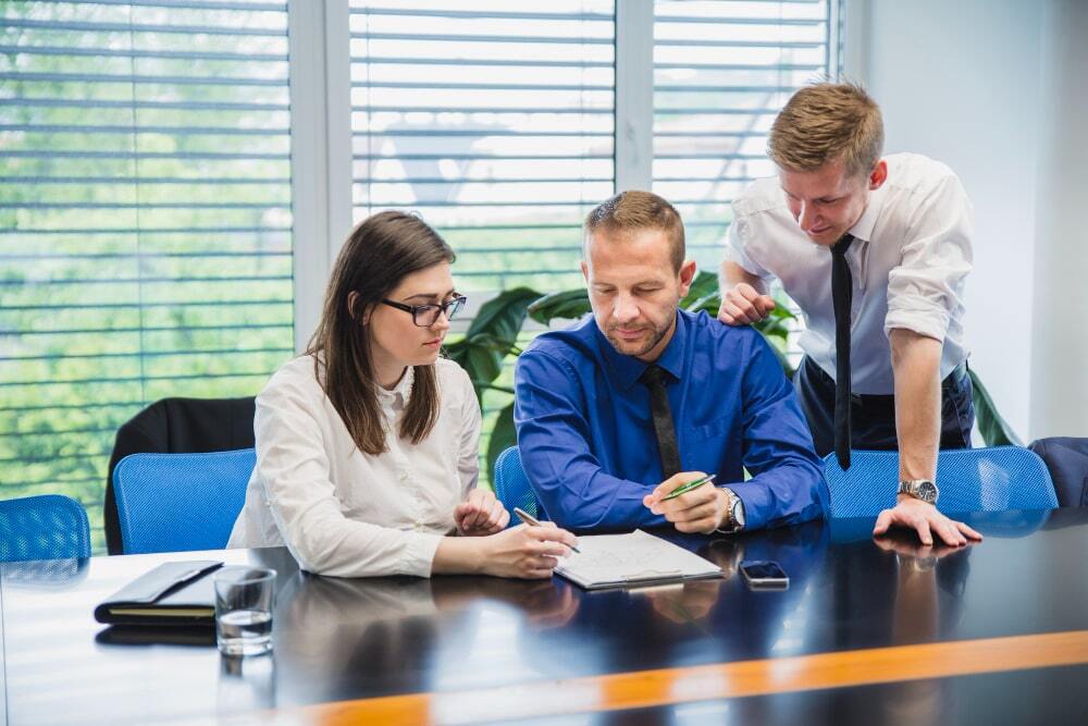 When to Consider Civil Litigation Common Legal Disputes Explained (A team can be seen discussing all the considerations for civil litigation in regards to legal disputes)