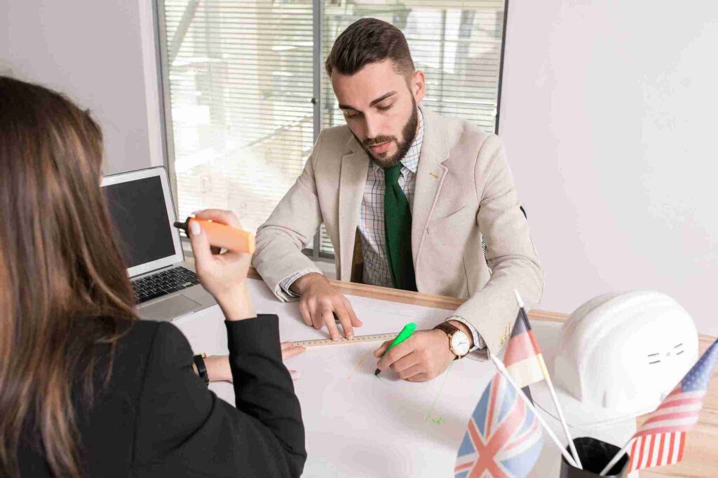 An immigration solicitor is explaining to her client about the Immigration changes