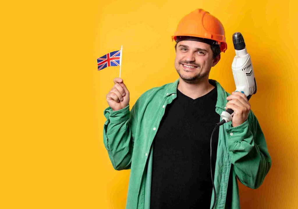 In the image a UK flag can be seen along with a skilled worker at work.UK Skilled Worker Visa 2025 Changes in Rules Key Changes