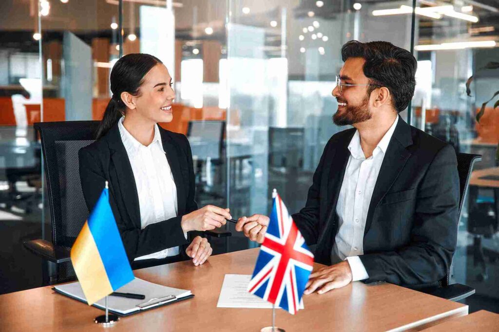 In the image an immigration solicitor can be seen approving a temporary work visa UK, UK 2-Year Temporary Work Visa Complete Application Process