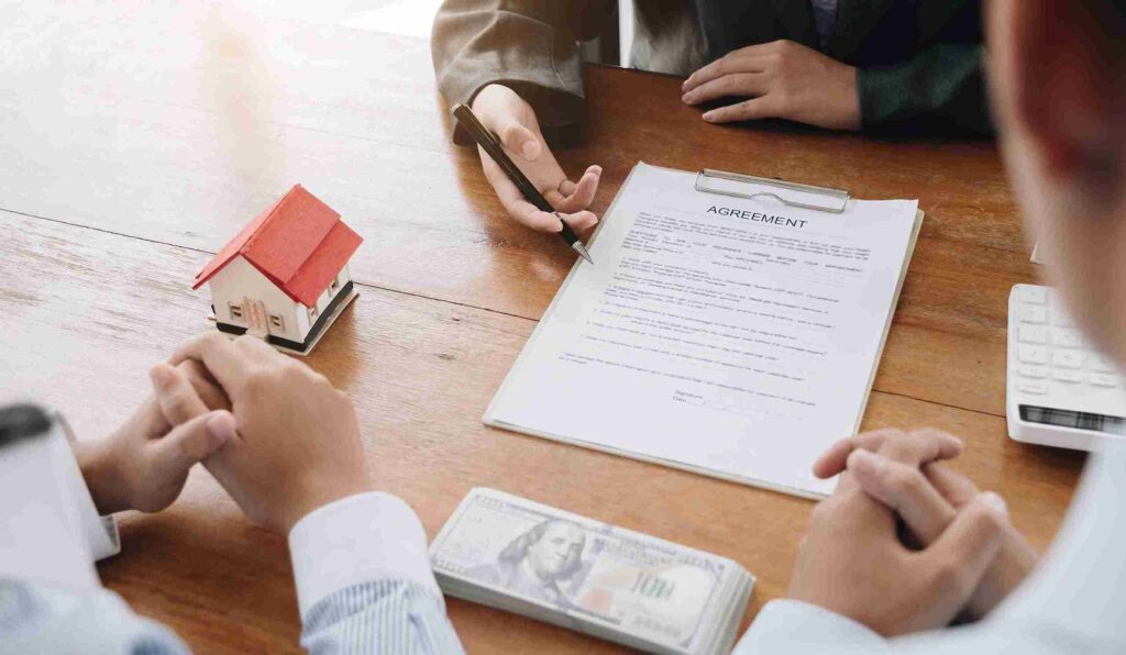 In the image you can see a client having their first consultation with her solicitor