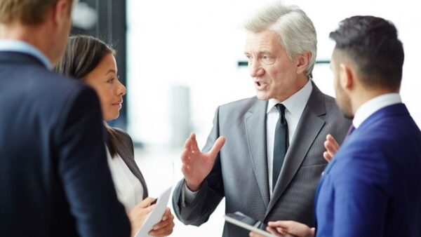 (In the image you can see a senior solicitor instructing the witnesses)
