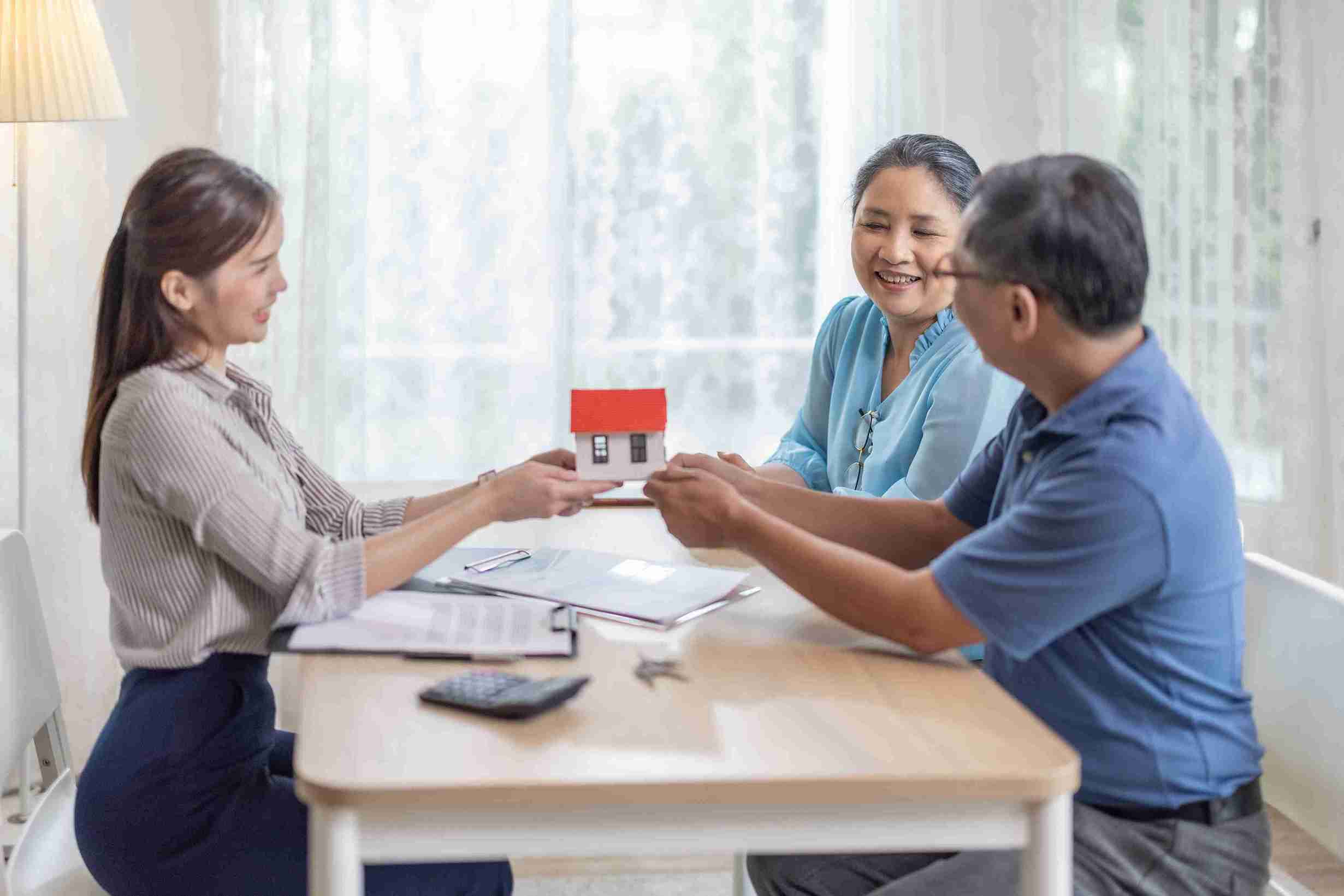 In the image we can see home movers upgrading into a new home and preparing to move in.