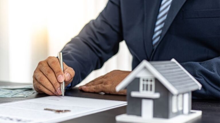 Blog (In the image a solicitor can be seen working on a local property dispute case)