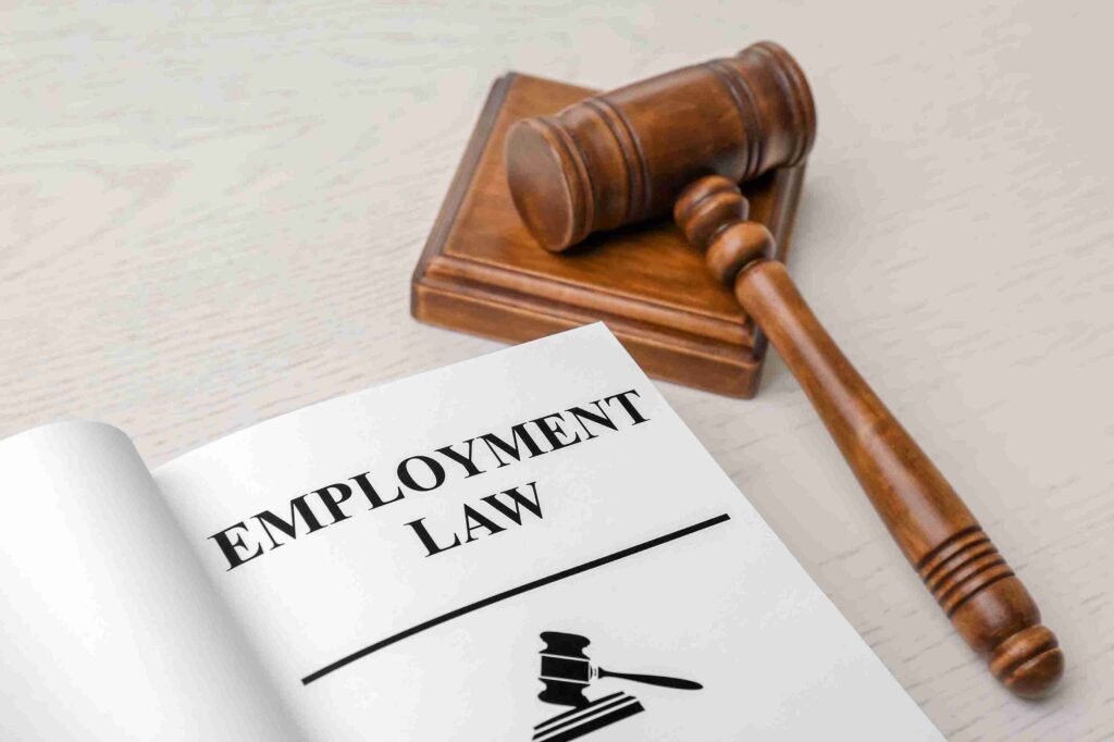 This image is showing a solicitor is telling an employe about the Employment Tribunal Rules in his office
