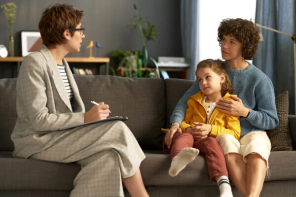 UK Child Adoption Process | Comprehensive Guide for Couples Adoption assessment interview, demonstrating support for mother and child