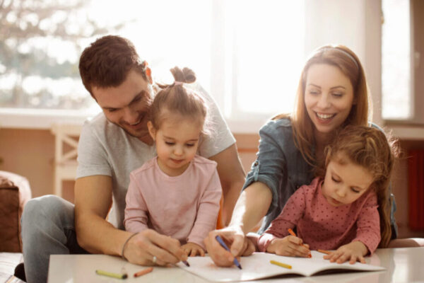 Understanding Your Rights: A Guide to Parental Rights in UK Family Law Parents and children drawing, illustrating active involvement and a stable family arrangement.