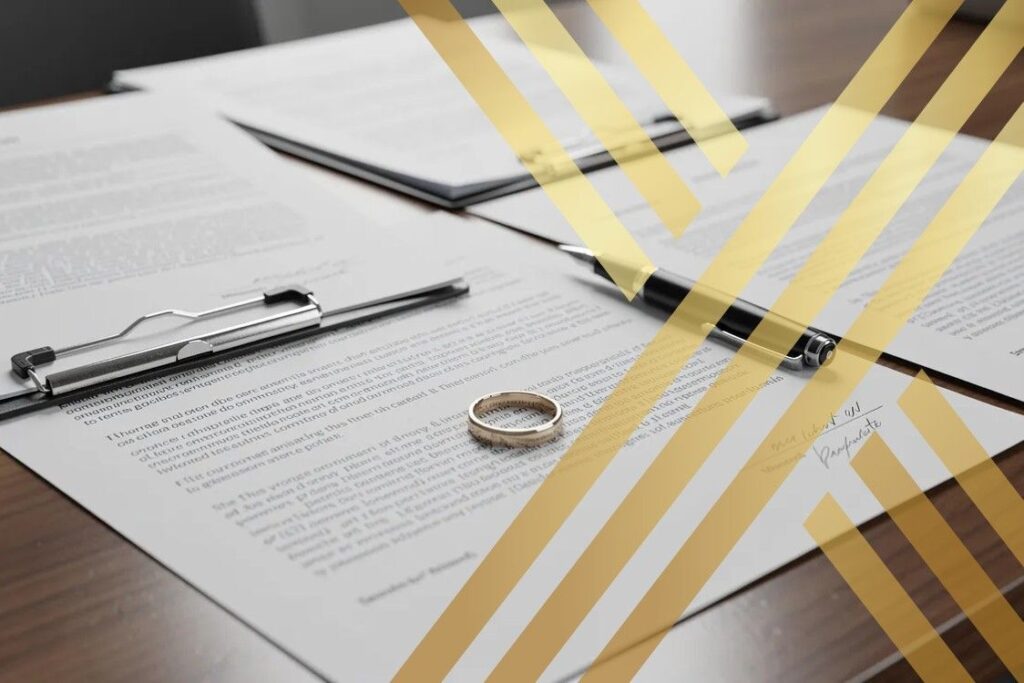 The image depicts a set of professional legal documents alongside a wedding ring on a desk, symbolising the legal process involved in marriage annulment.