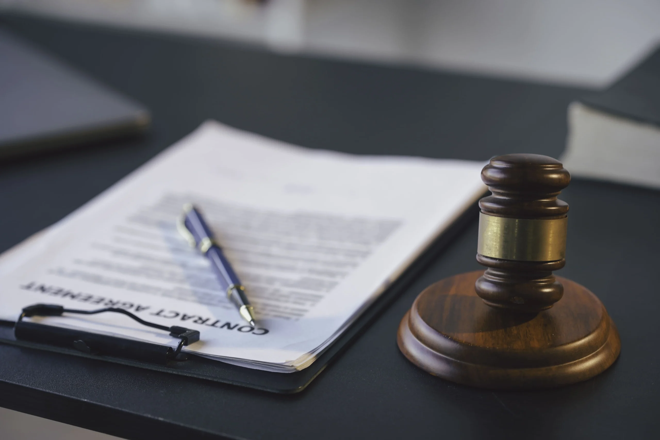 Judge’s gavel on a desk next to legal documents representing enforceability of separation agreements.
