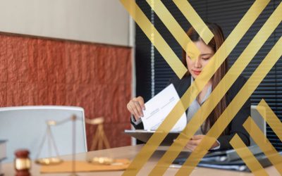 A UK immigration specialist reviewing documents for a student's Further Leave to Remain application
