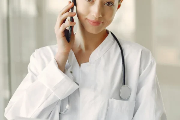 a photo of a clinical and medical negligence consultant and legal claims expert making on the phone during a remote consultation with the london office.